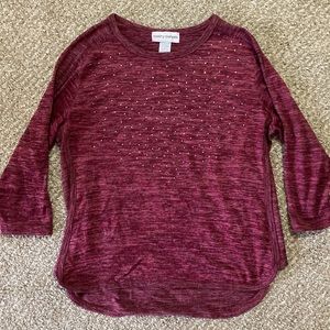 Burgundy shirt with gem stones on it